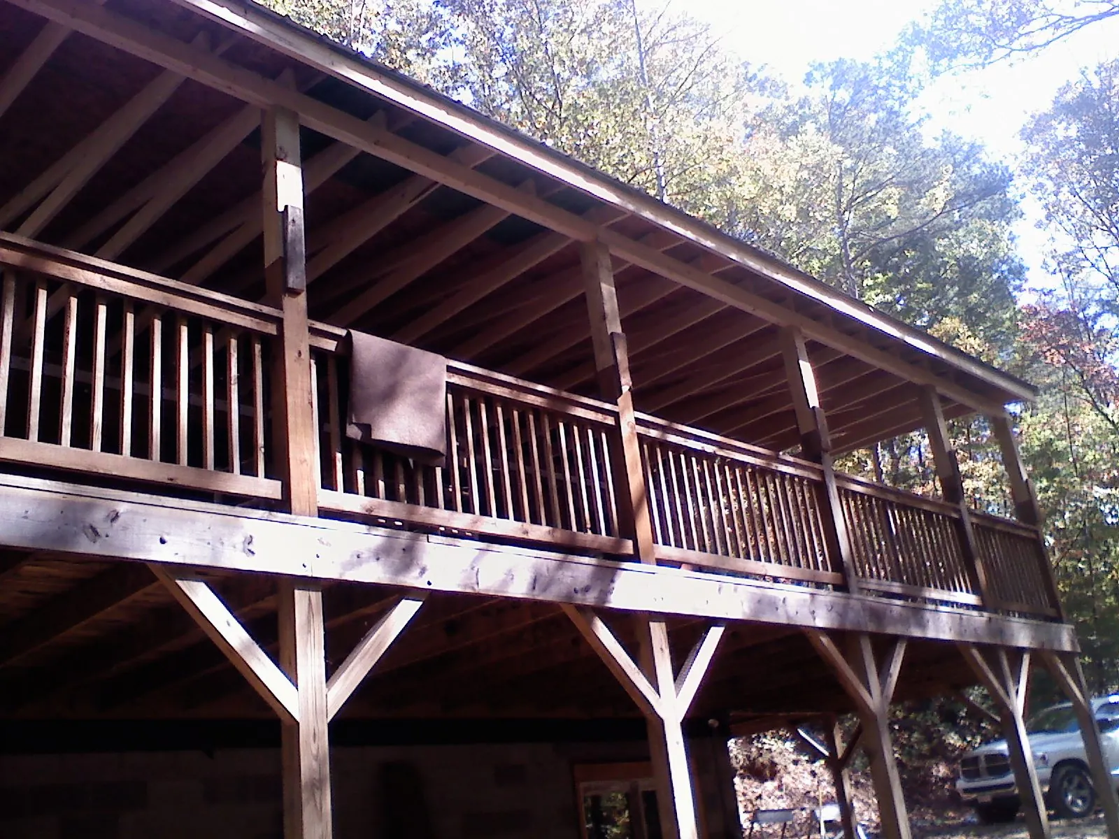 Timber framing under a new elevated porch and deck — Roof Leak Repair in Boynton Beach by Roofing Brothers